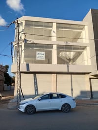 بناية تجارية • ١٠٠م • حي الزيتون