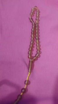 كهرمان أصفر • ٣٣ حبه • ٢٥ جرام