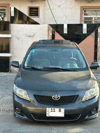 كورلا 2009 امريكية  هزه ورقم جديد  ماشيه 124 حقيقي مكينه 1800  تخم تاي...