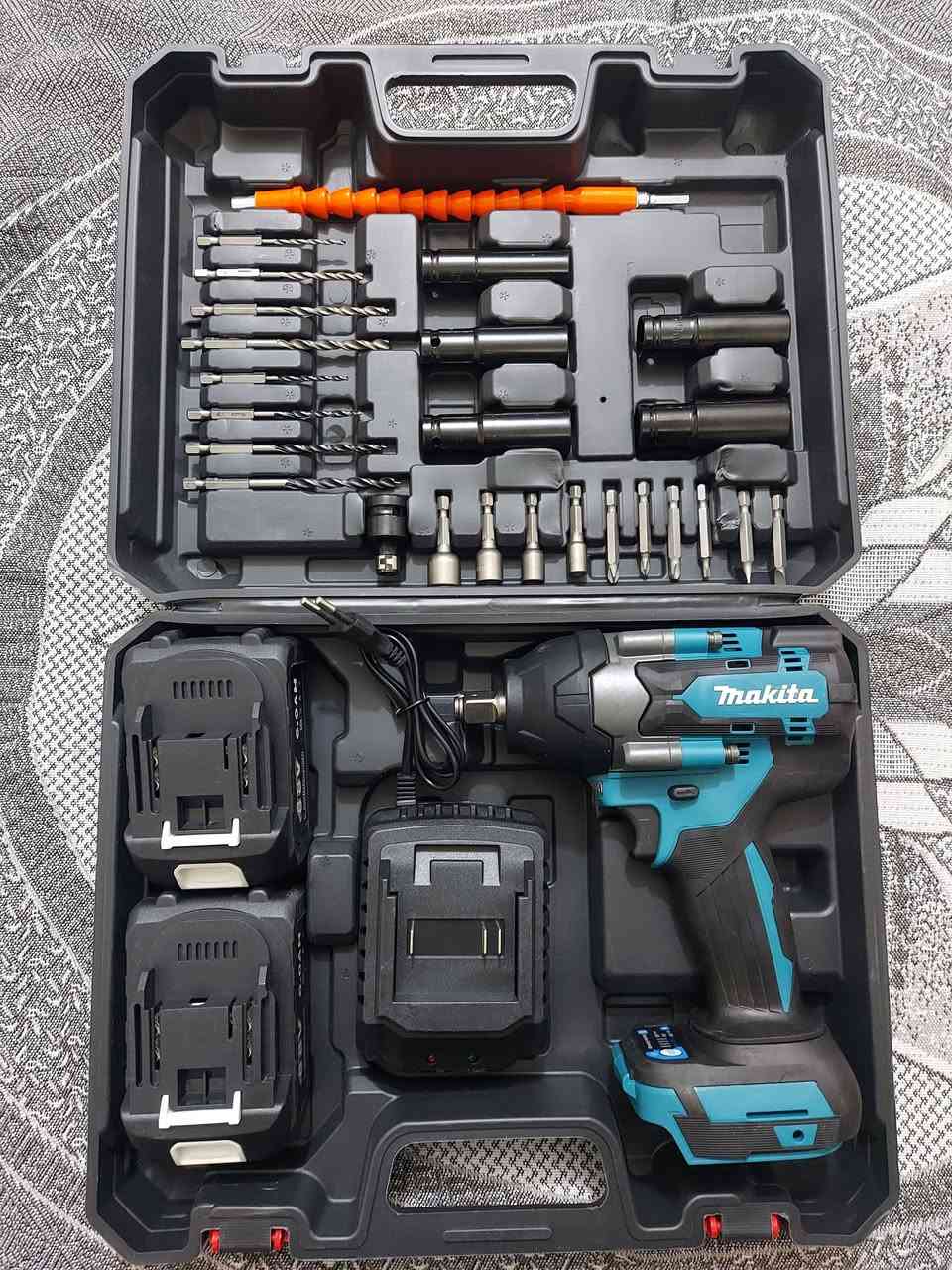 دريل لقمة MAKITA فحل2000 نيوتن اربع سرعات مع دبل بطارية الحجم الكبير مع شاحنة سوبر جارج مع حقيبة مع تحويله امباكت درنفيس براين  كامل ملحقات السعر 60 ويه التوصيل ***********
