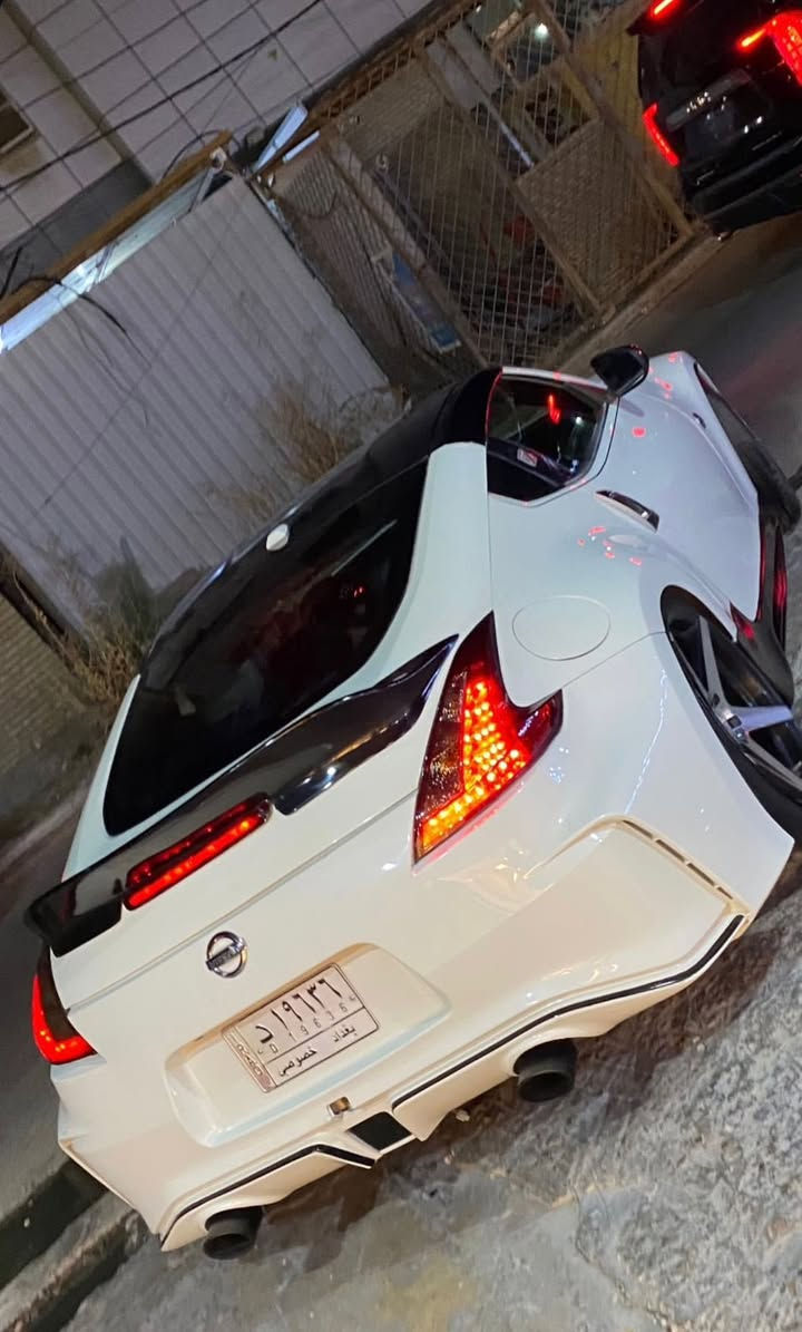 Nissan z 370 nismo تزويد موديل ٢٠١٤

كير اوتو تيبرونك فول مواصفات 

لون ابيضّ اصل مرشوشة كلير 

كامل ضربتها خشم البنيد دعاميات نسمو اصل ويل فوسن نجمة

فجوج برمبو كشنات كهربائية تدفئة

شاشة دشبول اصل جنجر خزن سيدي عدد ٦ شفتات بالستيرن
 مثبت سرعة تحكم ستيرن جهتين مود درفت عالمي

  السيارة حيل حيل ما متعوبة و جانت ضامها ماشية ٢٠ الف كيلو اصل السيارة( وصلته اني ٣٢ الف كيلو ) 

سيارة ما بيهه اي نقص كاملة مكملة بس حط رجلك علبانزين وتوكل 

ال سعر ((( 130 ))) ورقة  وبيهه مجال

 السيارة كلفتني اكثر بهواي بس يستاهل الياخذها للتواصل 
***********
