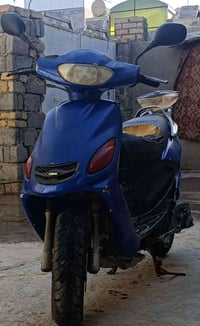 اكزز • دراجه