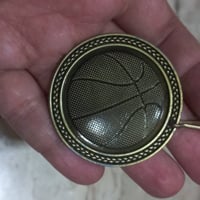 مسكوكة • تذكارية • كرة السلة