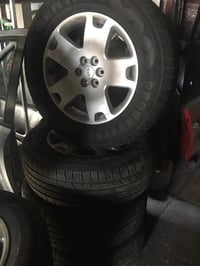 طقم • ١٨ بوصة • مع إطارات