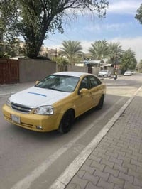 للبيع اوبترا 2012 شركه العامه رقم بغداد بسمي مصفره غرامات هيئا بيه جام...