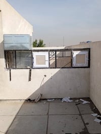 حدادة سبع الدجيل • في بلد • تصليح أبواب