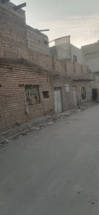 دار للبيع في محلة الشعله قرب المدرسه العباسية المساحة ١٦٥ الواجهه ١٨وا...