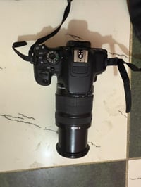 كامرة كانون D700 للبيع وياهة عدسة ١٨_١٣٥ كامره ما متعوبه ووجايبهة من خ...