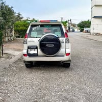 برادو ٢٠٠٩ • ابيض • قير ومكينة شرط