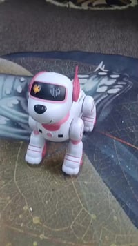 كلب روبوت • حركات بهلوانية • مربي على الدلال