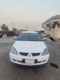 لانسر • ٢٠٠٩ • رقم ديالى