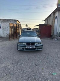 BMW رقم بغداد بسمي محرك 4سلندر تبريد شغال للبيع  مكاني بغداد الدوره ٠٧...