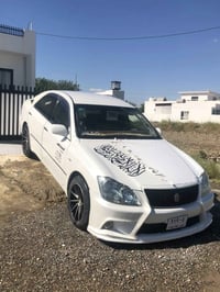 تويوتا كراون • ٢٠٠٥ • أحمر