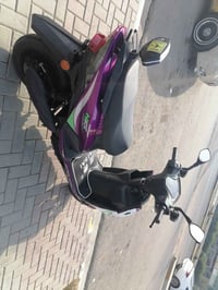 دراجة شحن ماكس 2024 للبيع بي ضرر قليل بدرع الدعامية  فقط ملف 2000 بطار...