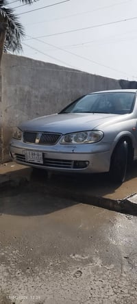 سياره نيسان سني ياباني 2007 بغداد بسمي محرك قبق اسود مكفول ما مفتوح لا...