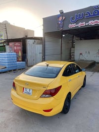 للبيع اكسنت امريكي موديل 2012 رقم بغداد الجديد بأسمي هيئه غرامات مسددة...