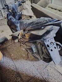 دراجة كوم حديد مدعومة بس لماشة مكينة شغالة عنوان بغداد مدينه الصدرالسع...