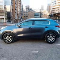 جميعاً  كيا سبورتج ازرق فيلي فول مواصفات رقم بغداد الجديد  مكفوله من ا...