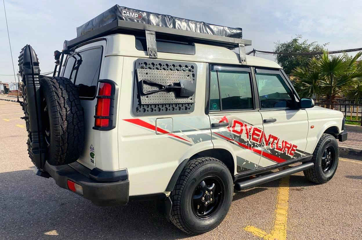 #ملاحظة/ مكلف بالنشر
الرجاء الإتصال او مراسلة راعيها فقط ***********
للبيع او المراوس حسب القناعة
Land Rover Discovery 2
موديل 2000. 
▪️محرك TD5 "گاز" 5 سلندر 2.5 / أنـجكتر 
▪️گير أُوتوماتيك 4X4
▪️نظام سبورت 
▪️نظام ABS 
▪️دعامية أمامية ARB
▪️منضدة مطوية 
▪️دوسات جانبية.
▪️سيباية Aluminum Boiled.
▪️خيمة سقف +CAMP. جلكان +CAMP.
▪️خزان ماء. 
▪️درع بلاستك حماية جام خلفي مع حقيبة مع مجرفة. 
▪️درع حديد أمامي اسفل أصلي (  Land Rover ) 
▪️شاشة مع كاميرا خلفية وأمامية 
▪️تخم تاير جديد مع السبير ( 5 ) قبل اسبوع شادهن
▪️تبريد ثلج. 
▪️رقم بغداد. سنوية وهزة جديدة بإسم راعيها لغاية2031
▪️لايت مع بلوجكترات زنون . مع LED Bar وبلوجكتر بنيد. 
▪️أكسل أمامي وخلفي جديد. 
▪️جميع الكهربائيات شغالة. 
▪️السيارة مكفولة من التبديل والقطع والحادث فقط بارد وتكحيل في الجهة الايسر الخلفية.
#السعر ( 145) قابل للتفاوض
