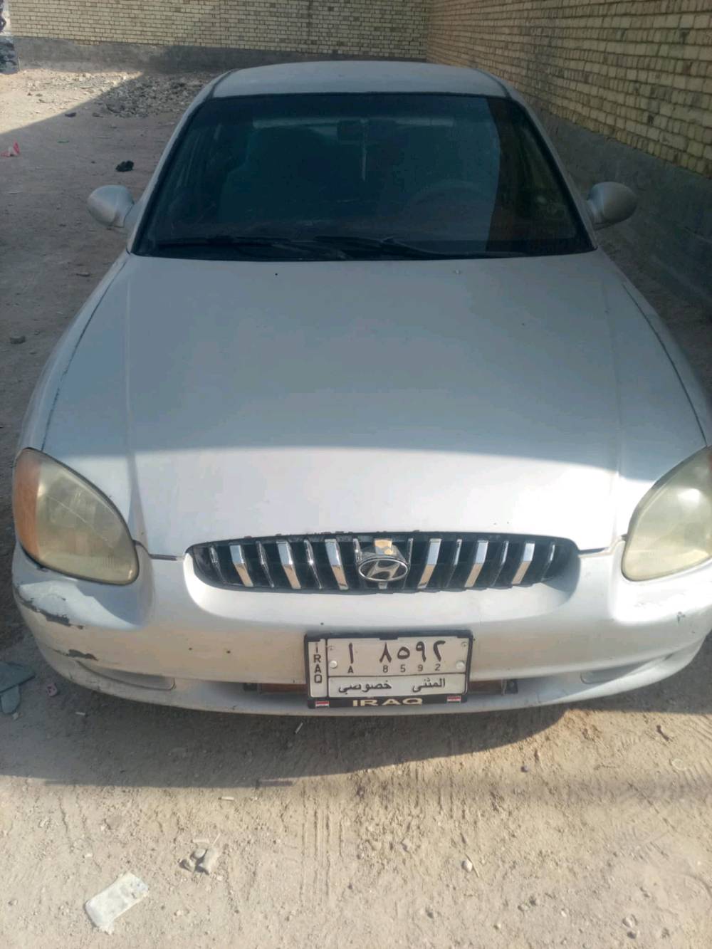 سوناتا للبيع موديل مثنى٢٠٠٠بدون صبغ مكينة بيها خيط بخار تخم تاير حدادية بيها كتاب من الكمارك معنون إلى المنطقة الجنوبية سنة ٢٦ معاملة كاملة من السماوة وراعيها الشرعي ابو السنوية مااندلة داخلة عن طريق طريبيل بدون قرص السيارة أصولية مكان السيارة غماس وإذا اكو مراوس  بس رقم انكليزي