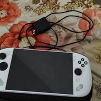 جهاز lenovo legion go s لبيع هارد 1TP و وياه جنطه و الشاحنه مالته 65 و...