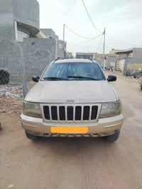 للبيع جيب كراند شيروكي موديل 2000رقم سليمانية بإسمنه سياره بدون صبغ مك...