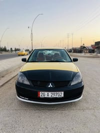 لانسر ٢٠١٠ • محرك ١٥٠٠ • رقم ديالى