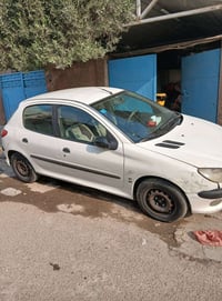 بيجو ٢٠٦ موديل ٢٠٠٩ اللون ابيض رقم انكليزي تحويل جديد كير عادي  غرفه ن...