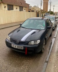 مازدا ٣٢٣ • ٢٠٠٠ • أربيل