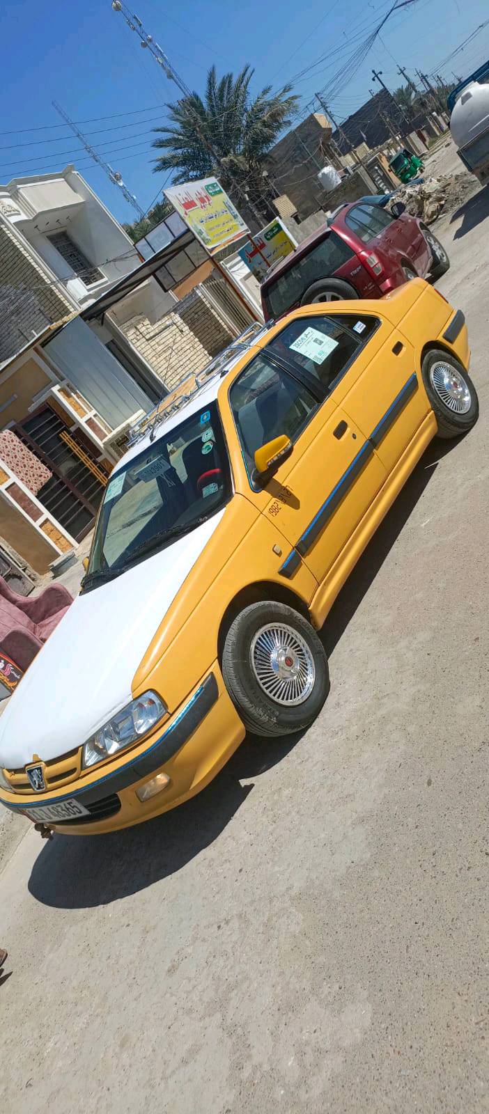 بيجو بارص رقم بغداد موديل 2015 بيها تبخير/ومااعرف باقي التفاصيل 