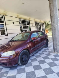 للبيع اوبل استر  مديل 2002 رقم انكليزي سنويه لل2030رقم بغداد  صدر جديد...