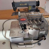مكينة خياطة • اوفر • شرط