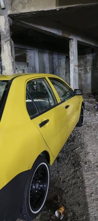 لانسر 2010 أوتو صفره رقم بغداد الدولي الجديد تحويل ثاني يوم سيارة جاهز...