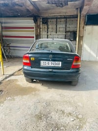 اوبل مديل ٢٠٠٢ الشركه العامه مصبوغه حزام للجماليه السياره كلش نضيفه بي...