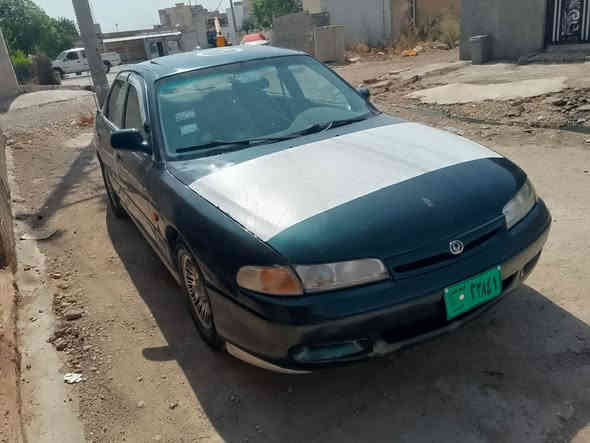 مازدا موديل 1993
گير عادى 
تبريته 
سلايته 
جام كاره بايه
گيرو مه كينه ى به شه رت 
براوه وه رگه ران به شه رت 
ارم پلاستيك و سه نه ويه 
تازه جوار تايه ى لو به سترايه 
33وه ره قه و معامه له 
***********
