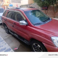 سبورتج 2009 خليجي محرك 2000 رقم بغداد  بدون ضربه  سعر88  07730581968