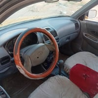 اكسنت فيرسه • ٢٠٠٤ • نجف