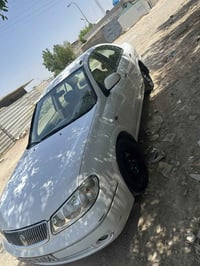 نيسان سني ياباني 2009  السيارة مكفولة كير مكينة كهربائيات تبريد ثلج   ...