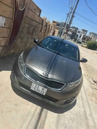 اوبتما 2014 رقم بغداد  بيها اربع قطع صبغ سياره كامله مابيها اي نقص  مح...