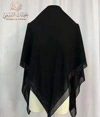 جرجيت ستراس • كفوف • توصيل بغداد