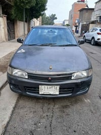 متسيوبيشي ميراج موديل 1995 كير اوتوماتيك ماشيه 300 الف كلها عل بلاد وب...