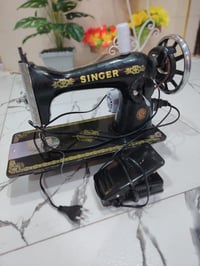 مكينة خياطه سنجر شغاله ب 45 للاستفسار 07705575054