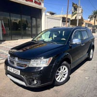 دوج جورني موديل 2014 السياره كلش نضيفه وجديده وجاهزه من كلشي كير مكينه...