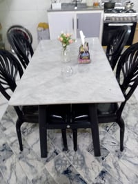 ميز طعام مرمر معا اربع كراسي اخو الجديد السعر 130الف 07745058665