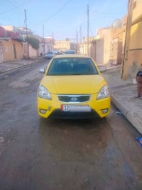 كيا ريو • ٢٠١١ • ضرر امامي