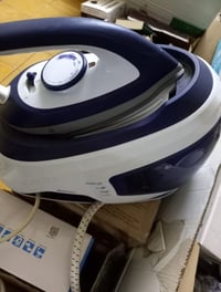 مكوي بخاري • مستعمل • نظيف