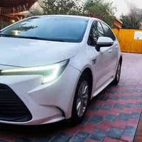 ورحمة 07724869182 كورلا موديل 2023 هايبرد السياره وارد ياباني اصل يابا...