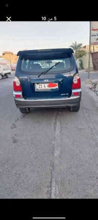 هيونداي تريكان ٢٠٠٢ بلادي بدون صبغ كير ومحرك فيفي تي تبريد شغال رقم سل...