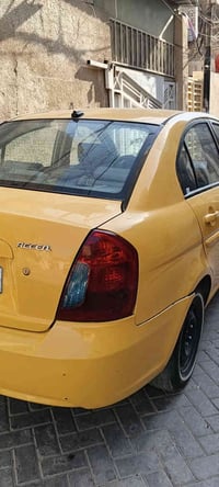 هيونداي اكسنت 2008 صفراء تكسي  السعر 80وبيهه مجال الشراي  الاتصال 0771...