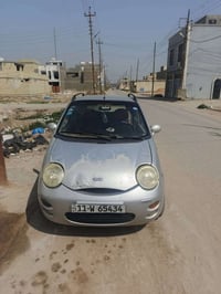 عندي سيارة كيو كيو2011 كير ومكينة اوتو سيارة تدفئة تبريد وكهربئيات كله...